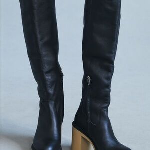 Dolce Vita Black and Tan Heeled Boots